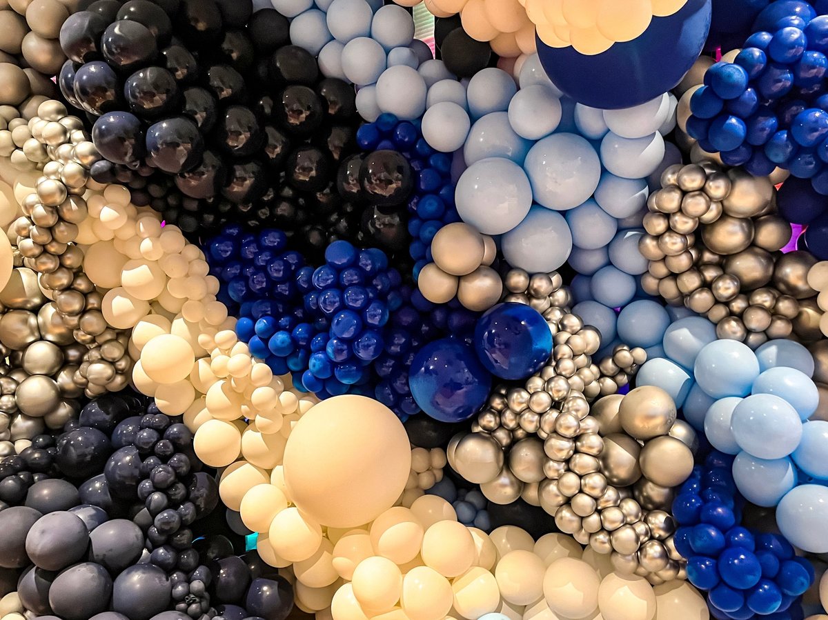 Wall of colorful balloons celebration decorations